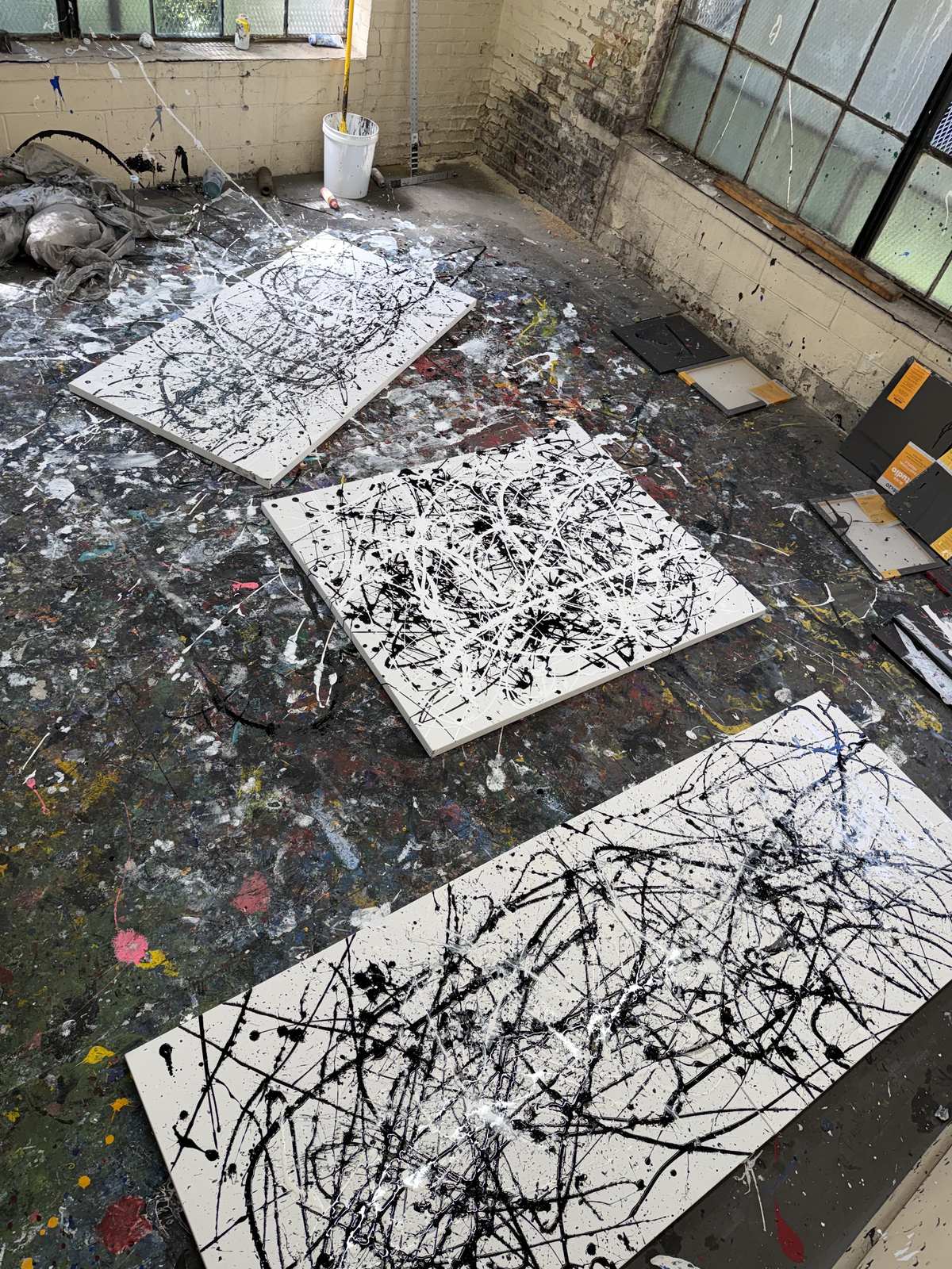 Three works drying under the windows