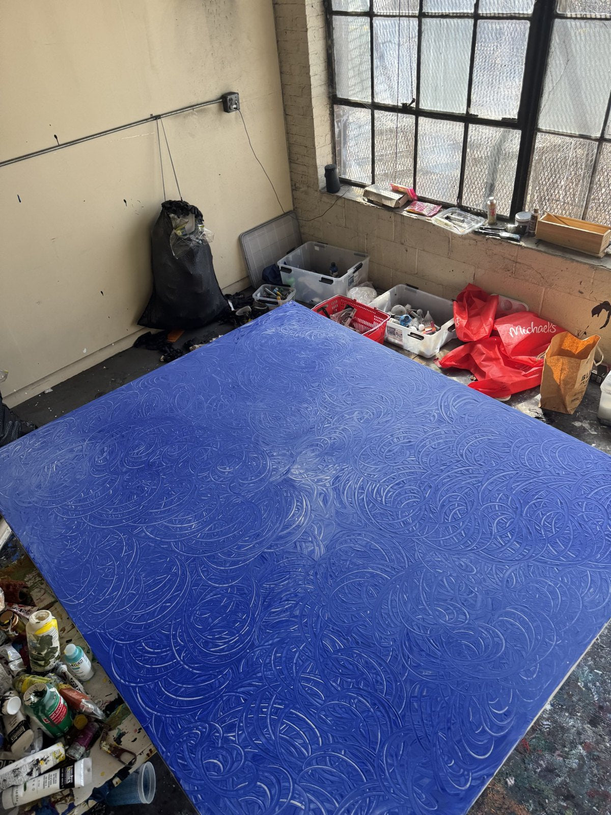 Blue, on the floor